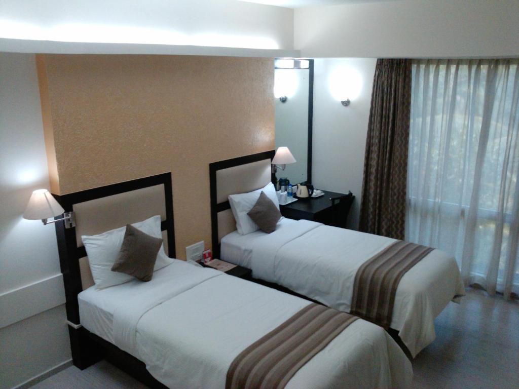Pattom Royal Hotel Thiruvananthapuram Pokoj fotografie